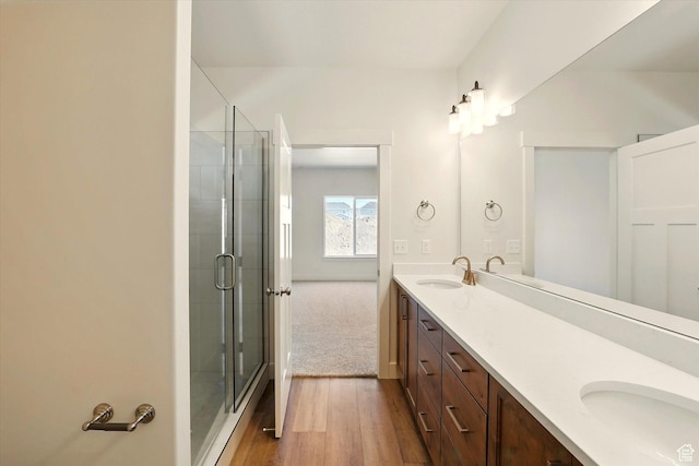 222 W 825 S, Willard, UT 84340 - bathroom with double vanity, a shower stall, and wood finished floors