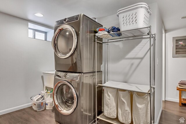 15 S 1200 E, Salt Lake City, UT 84102 - laundry area with stacked washer / dryer, baseboards, wood finished floors, and recessed lighting