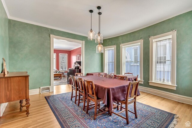 15 S 1200 E, Salt Lake City, UT 84102 - dining room featuring wood finished floors, crown molding, and baseboards