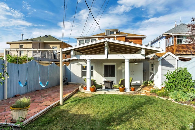 15 S 1200 E, Salt Lake City, UT 84102 - rear view of house with a patio area, stucco siding, a ceiling fan, and central AC