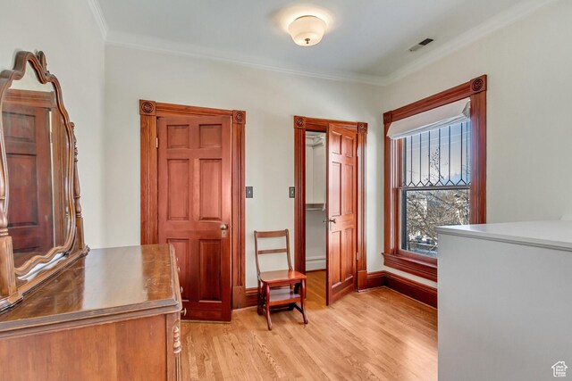 15 S 1200 E, Salt Lake City, UT 84102 - entryway with light wood-style floors, crown molding, and baseboards