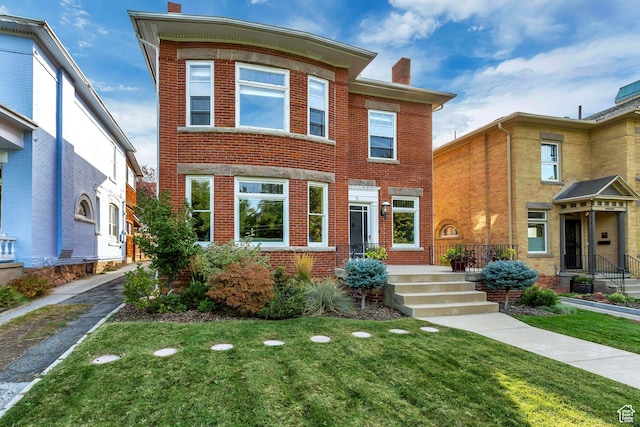 15 S 1200 E, Salt Lake City, UT 84102 - view of front of property featuring a chimney, brick siding, and a front yard