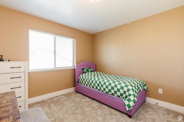 691 N 240 E Unit 39, Smithfield, UT 84335 - bedroom featuring carpet and baseboards