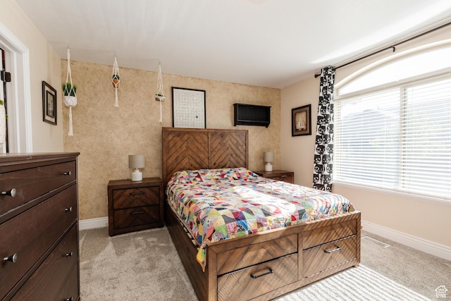691 N 240 E Unit 39, Smithfield, UT 84335 - bedroom with light colored carpet and baseboards