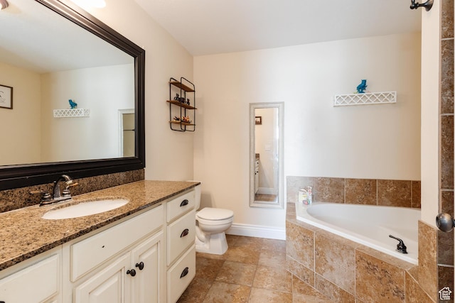 691 N 240 E Unit 39, Smithfield, UT 84335 - full bathroom featuring vanity, a garden tub, toilet, and baseboards