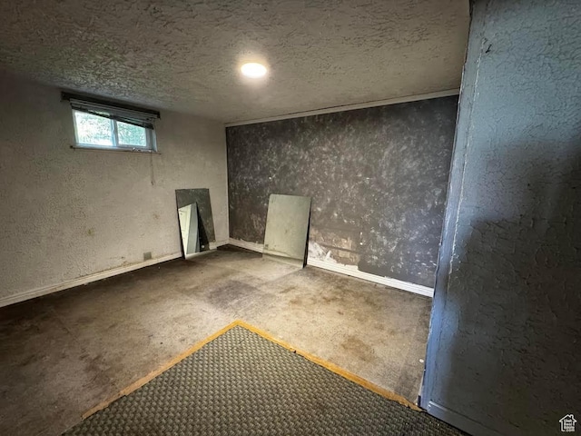 635 N Chimesview Cir E, Tooele, UT 84074 - carpeted empty room featuring a textured wall, a textured ceiling, and baseboards