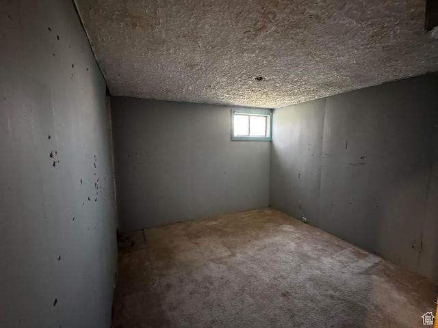 635 N Chimesview Cir E, Tooele, UT 84074 - below grade area with a textured ceiling and carpet floors