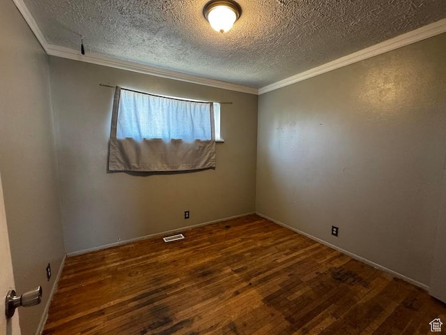635 N Chimesview Cir E, Tooele, UT 84074 - spare room featuring hardwood / wood-style floors, crown molding, a textured ceiling, and baseboards