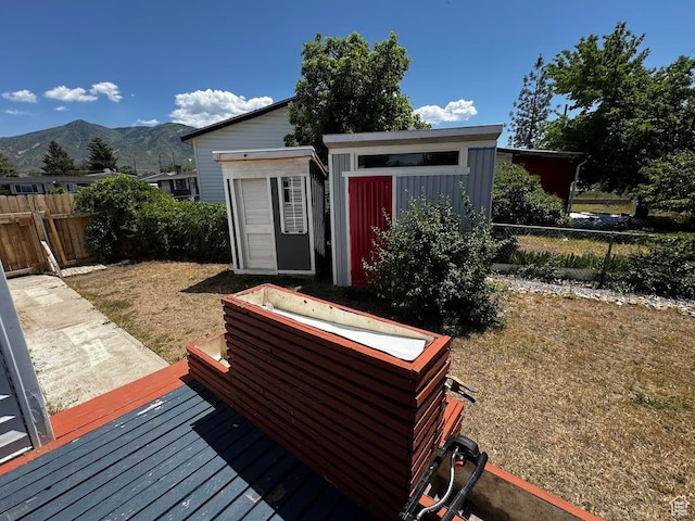 635 N Chimesview Cir E, Tooele, UT 84074 - deck with a mountain view and an outdoor structure