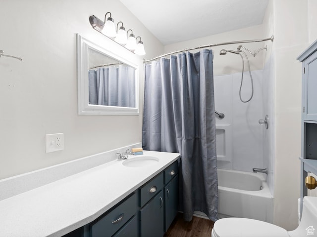 719 E 22nd St, Ogden, UT 84401 - full bathroom with toilet, vanity, shower / tub combo with curtain, and wood finished floors