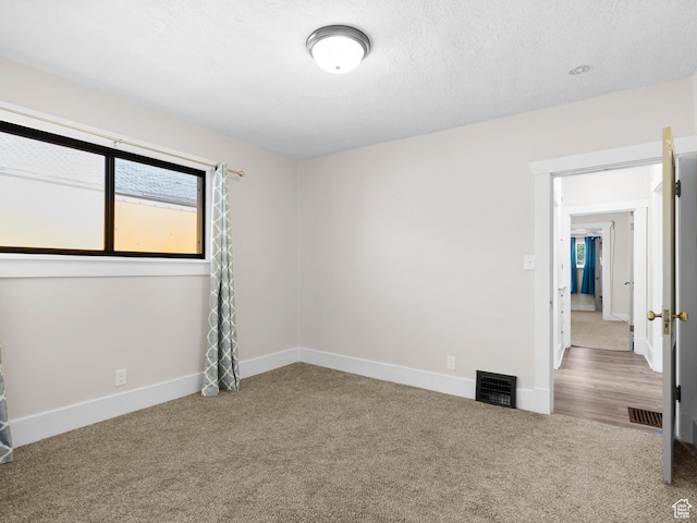 719 E 22nd St, Ogden, UT 84401 - carpeted spare room with baseboards