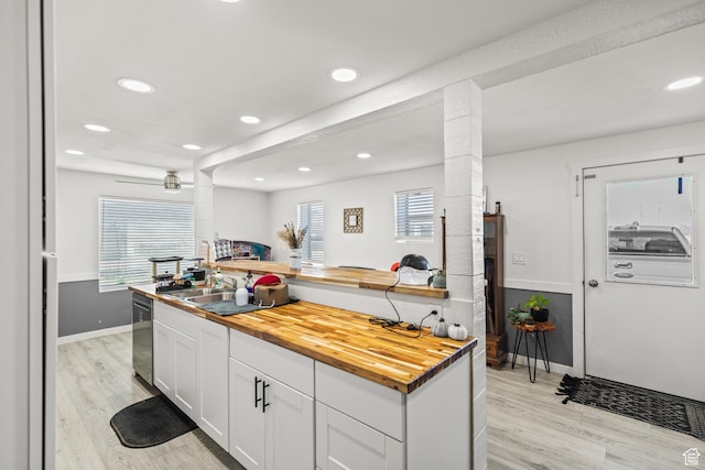 1725 N State St, Sigurd, UT 84657 - kitchen featuring butcher block counters, ornate columns, dishwasher, light wood-style floors, and recessed lighting