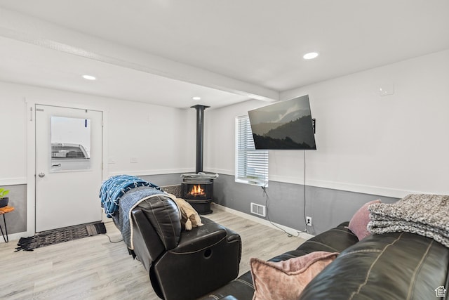 1725 N State St, Sigurd, UT 84657 - living area with a wood stove, wood finished floors, and recessed lighting