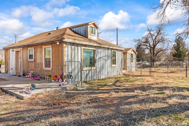 1725 N State St, Sigurd, UT 84657 - view of side of home with a patio area and a shingled roof