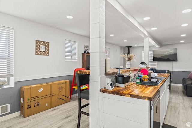 1725 N State St, Sigurd, UT 84657 - kitchen with decorative columns, light wood-type flooring, butcher block counters, recessed lighting, and open floor plan