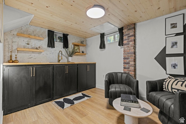 3510 Porter Ave, Ogden, UT 84403 - bar area featuring a sink, wood ceiling, light wood-style flooring, and tasteful backsplash