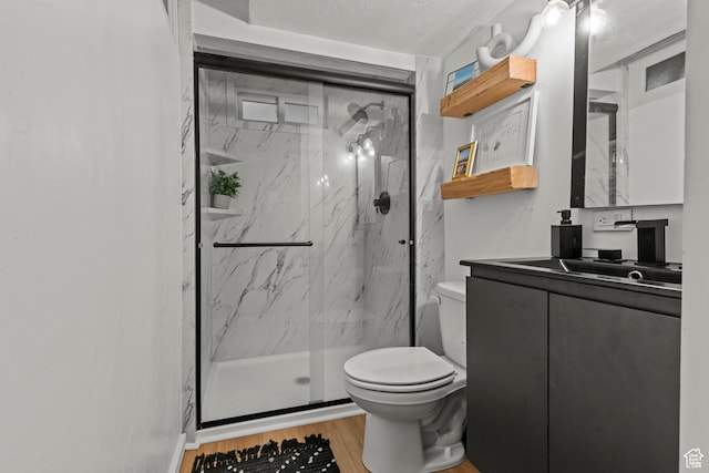 3510 Porter Ave, Ogden, UT 84403 - full bathroom featuring toilet, vanity, a marble finish shower, and wood finished floors