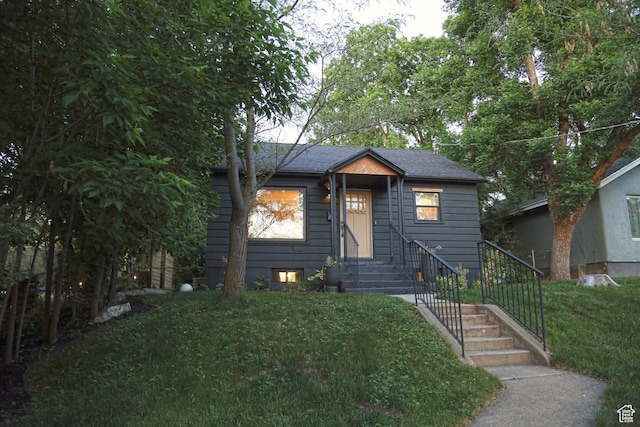 3510 Porter Ave, Ogden, UT 84403 - bungalow featuring a front lawn and a shingled roof