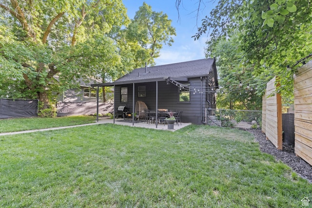 3510 Porter Ave, Ogden, UT 84403 - rear view of property with a patio area and roof with shingles