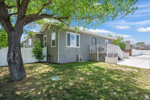 2137 W 6200 S, Salt Lake City, UT 84129 - rear view of property with a patio, stucco siding, and a deck