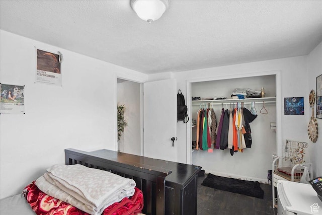 2137 W 6200 S, Salt Lake City, UT 84129 - bedroom featuring a closet, wood finished floors, and a textured ceiling