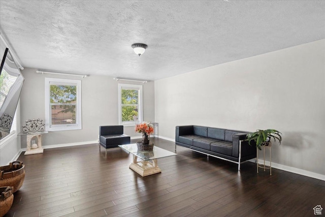 2137 W 6200 S, Salt Lake City, UT 84129 - living room with wood finished floors, a textured ceiling, and baseboards