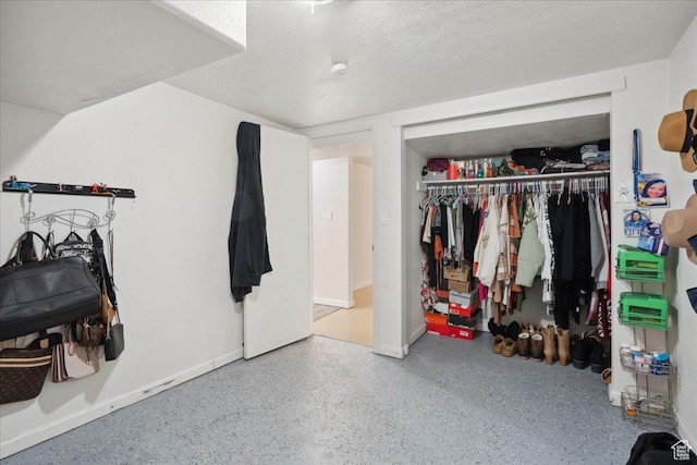 2137 W 6200 S, Salt Lake City, UT 84129 - bedroom with a closet, speckle patterned floor, and baseboards