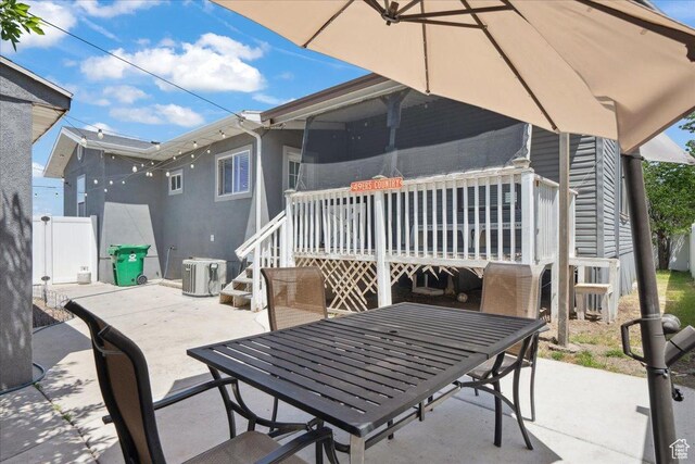 2137 W 6200 S, Salt Lake City, UT 84129 - view of patio with outdoor dining area and a wooden deck