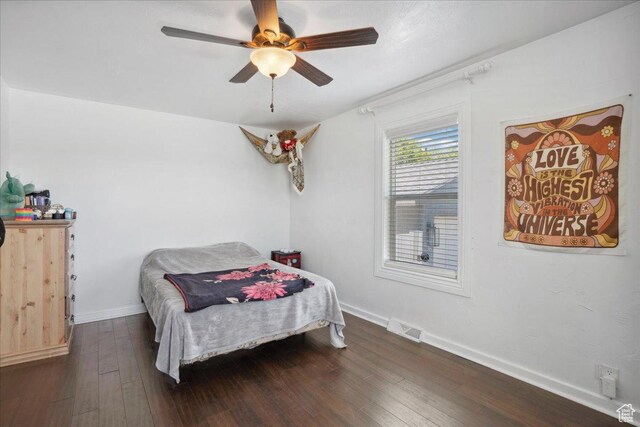 2137 W 6200 S, Salt Lake City, UT 84129 - bedroom with dark wood-style flooring, baseboards, and a ceiling fan
