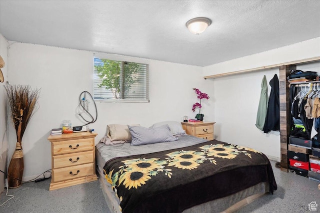 2137 W 6200 S, Salt Lake City, UT 84129 - bedroom with speckle patterned floor and a textured ceiling