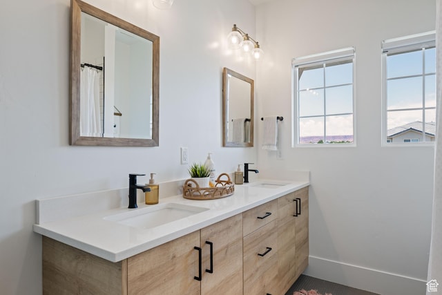 3322 S 2240 E, St George, UT 84790 - bathroom featuring double vanity and baseboards