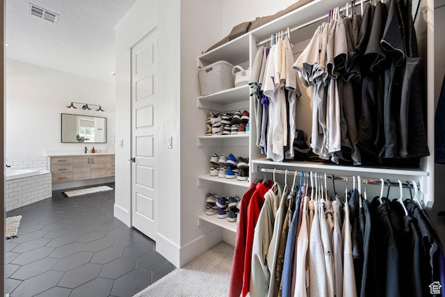 3322 S 2240 E, St George, UT 84790 - spacious closet with dark tile patterned floors