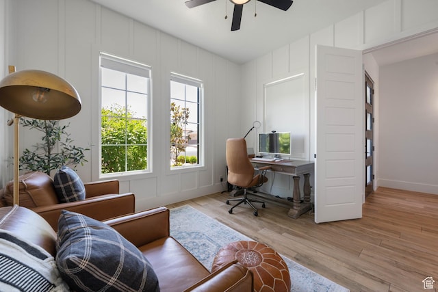 3322 S 2240 E, St George, UT 84790 - home office featuring ceiling fan, wood finished floors, a decorative wall, and baseboards