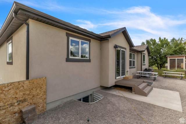276 N Elk Ridge Dr, Elk Ridge, UT 84651 - view of property exterior with a patio and stucco siding