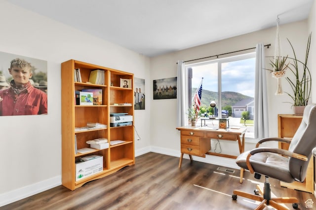 276 N Elk Ridge Dr, Elk Ridge, UT 84651 - sitting room featuring baseboards, dark wood-style flooring, a desk, and a mountain view