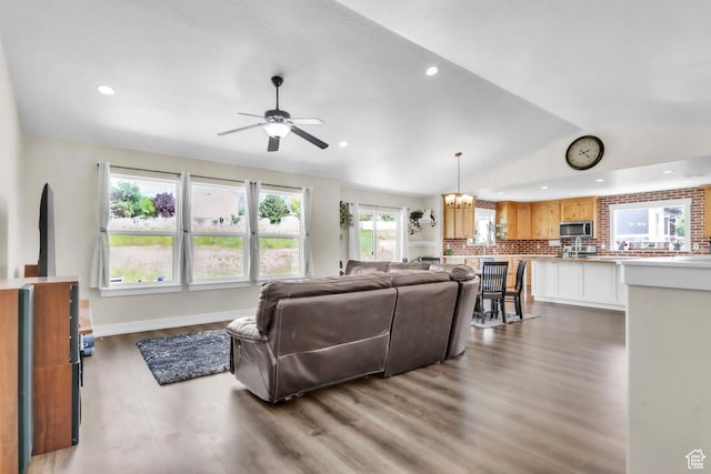 276 N Elk Ridge Dr, Elk Ridge, UT 84651 - living area featuring a ceiling fan, vaulted ceiling, recessed lighting, wood finished floors, and a chandelier