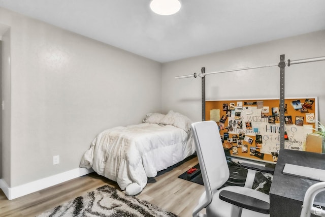 276 N Elk Ridge Dr, Elk Ridge, UT 84651 - bedroom with wood finished floors, an office area, and baseboards