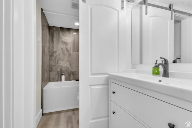 276 N Elk Ridge Dr, Elk Ridge, UT 84651 - full bathroom featuring vanity, wood finished floors, and shower / tub combination