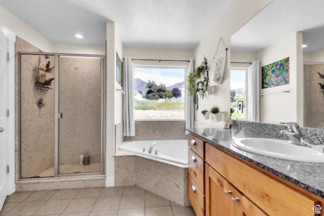 276 N Elk Ridge Dr, Elk Ridge, UT 84651 - bathroom featuring vanity, a shower stall, a bath, and tile patterned flooring
