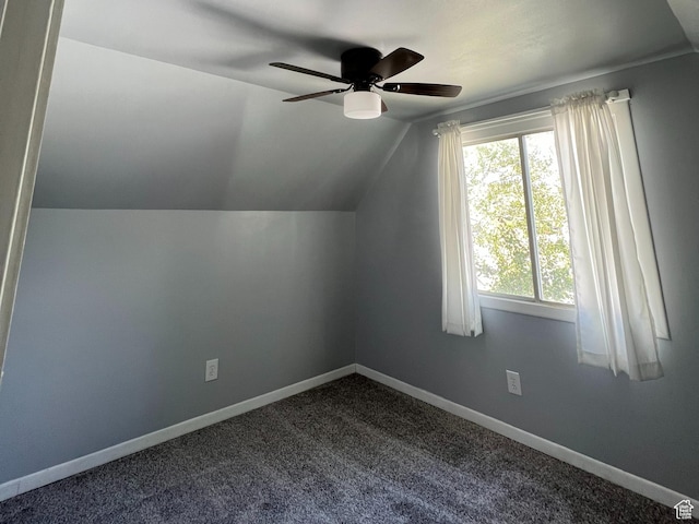 2717 S Orchard Dr, Bountiful, UT 84010 - additional living space with a ceiling fan, lofted ceiling, baseboards, and dark colored carpet