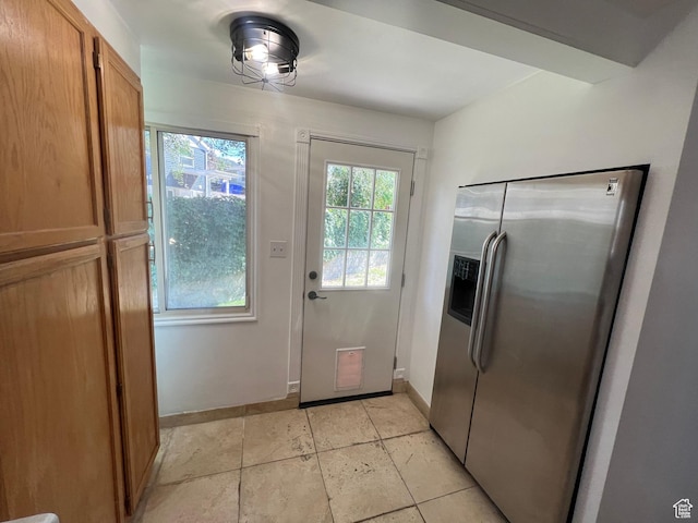 2717 S Orchard Dr, Bountiful, UT 84010 - entryway featuring healthy amount of natural light and baseboards