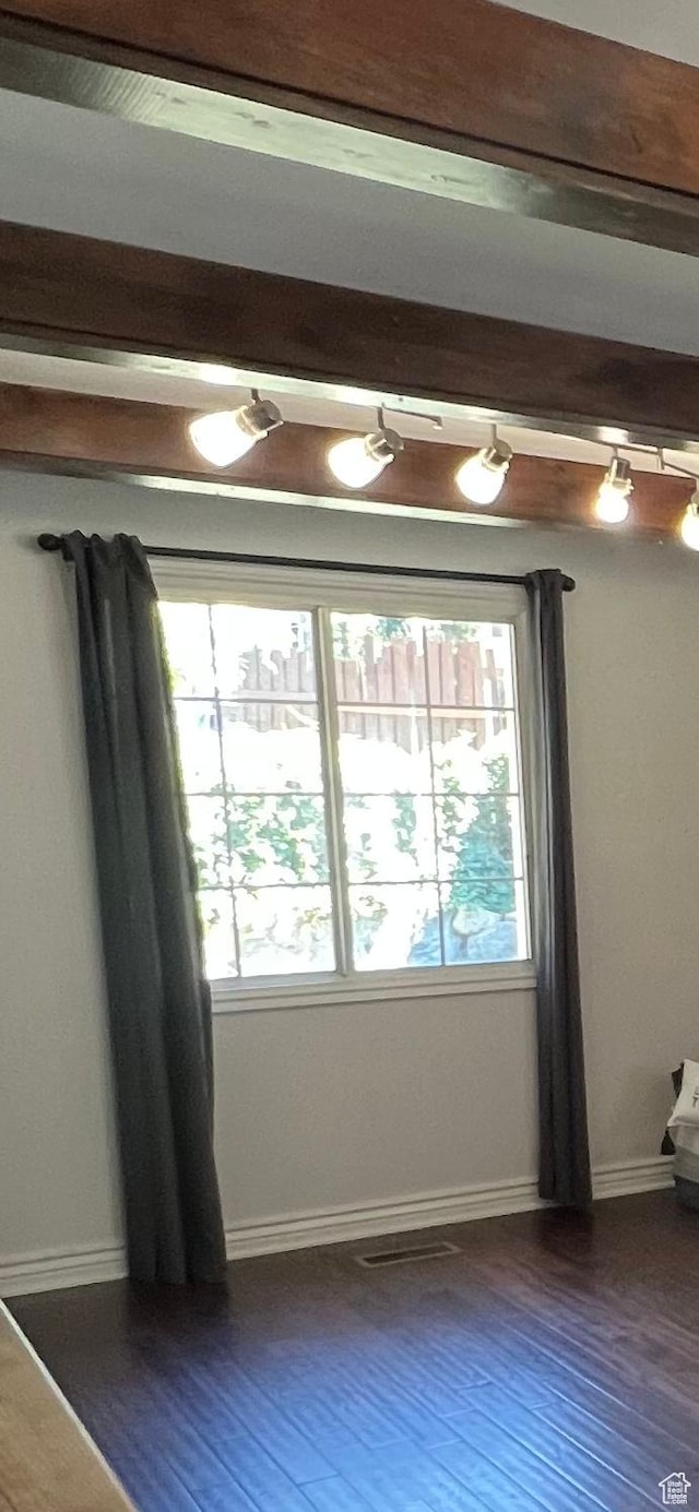 2717 S Orchard Dr, Bountiful, UT 84010 - unfurnished room with dark wood-style floors and baseboards