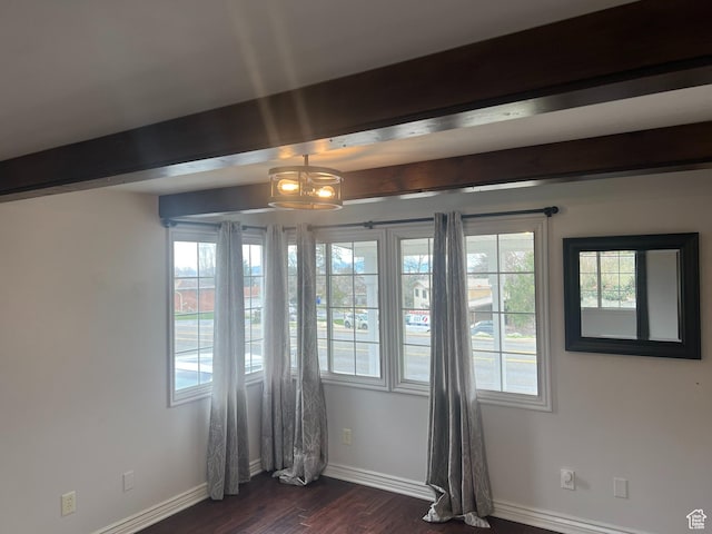 2717 S Orchard Dr, Bountiful, UT 84010 - unfurnished room featuring beamed ceiling, dark wood finished floors, and baseboards