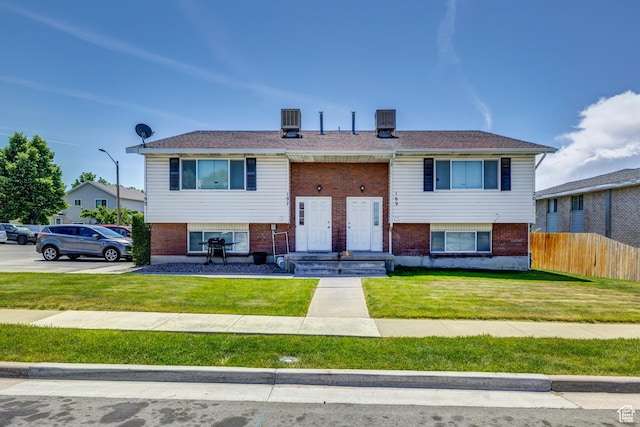 195 W 8480 S, Midvale, UT 84047 - raised ranch with brick siding and cooling unit