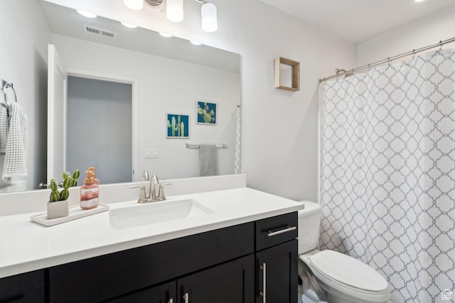 1006 W Firelock Way S, Bluffdale, UT 84065 - bathroom featuring toilet, vanity, and curtained shower