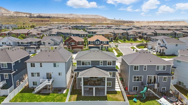 1006 W Firelock Way S, Bluffdale, UT 84065 - aerial view of residential area with a mountain backdrop