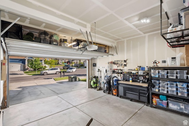 1006 W Firelock Way S, Bluffdale, UT 84065 - garage featuring a garage door opener