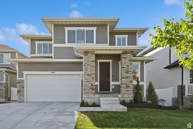 1006 W Firelock Way S, Bluffdale, UT 84065 - view of front of property with an attached garage, concrete driveway, and stone siding
