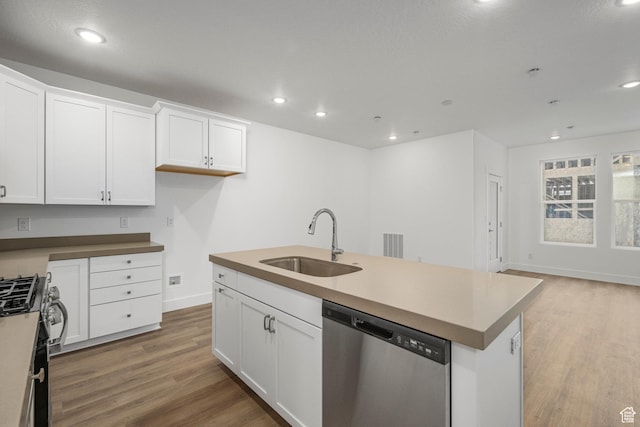 1766 W 160 S Unit 49, Pleasant Grove, UT 84062 - kitchen with stainless steel dishwasher, light wood-style flooring, recessed lighting, gas stove, and white cabinets