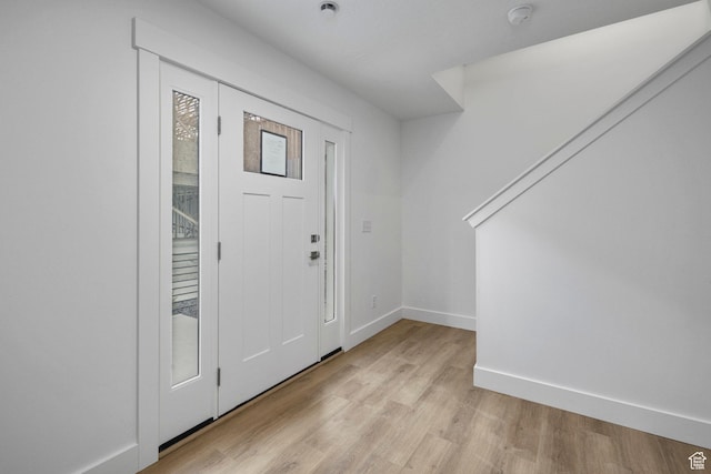 1766 W 160 S Unit 49, Pleasant Grove, UT 84062 - foyer entrance featuring light wood-type flooring and baseboards